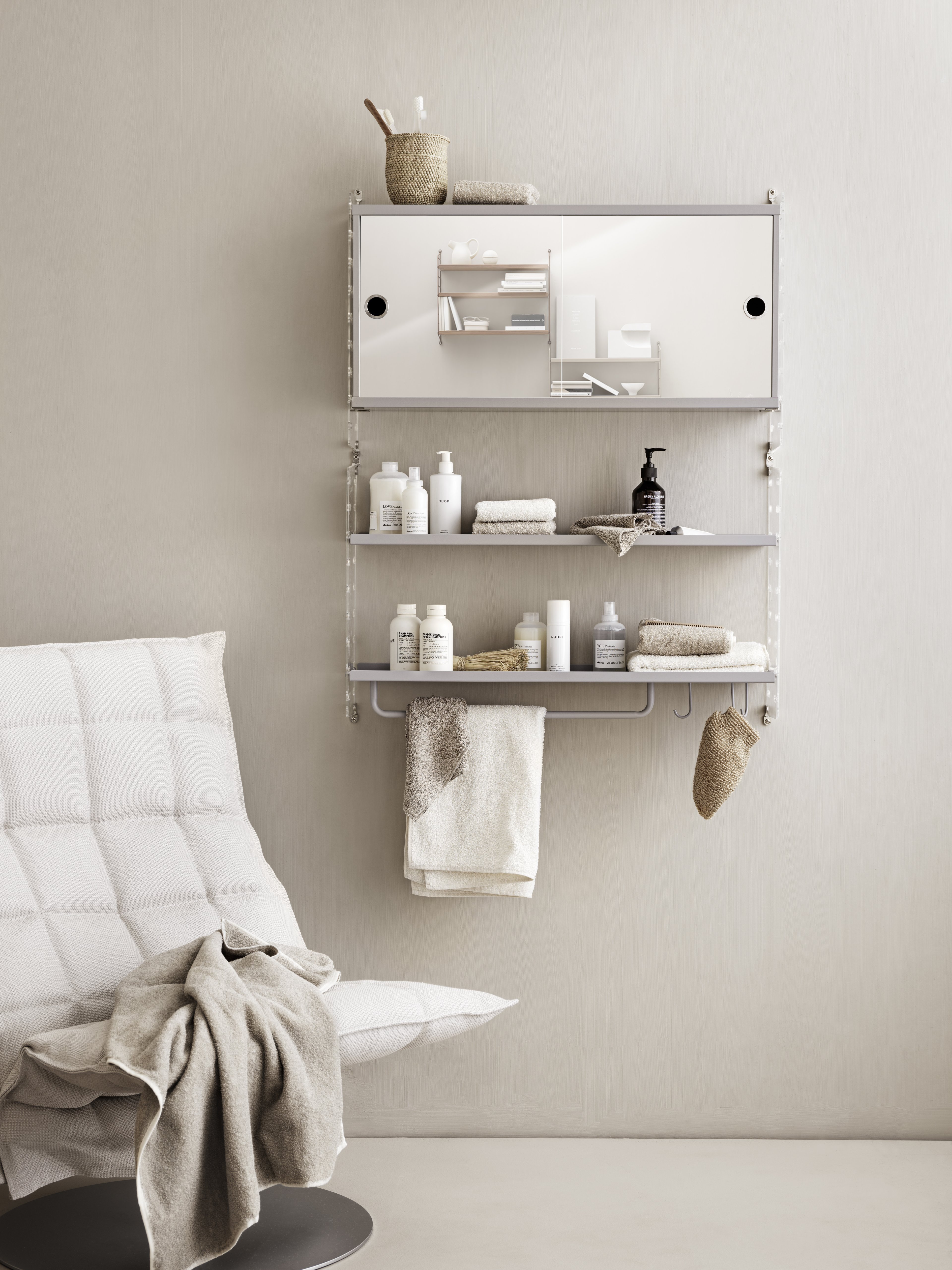 Neat wall-hung combination with plex panels perfect for the smaller or medium sized bathroom. Cabinets with mirror doors give you all the storage you need for your toiletries and shelves adorned with hooks open up for even more storage.