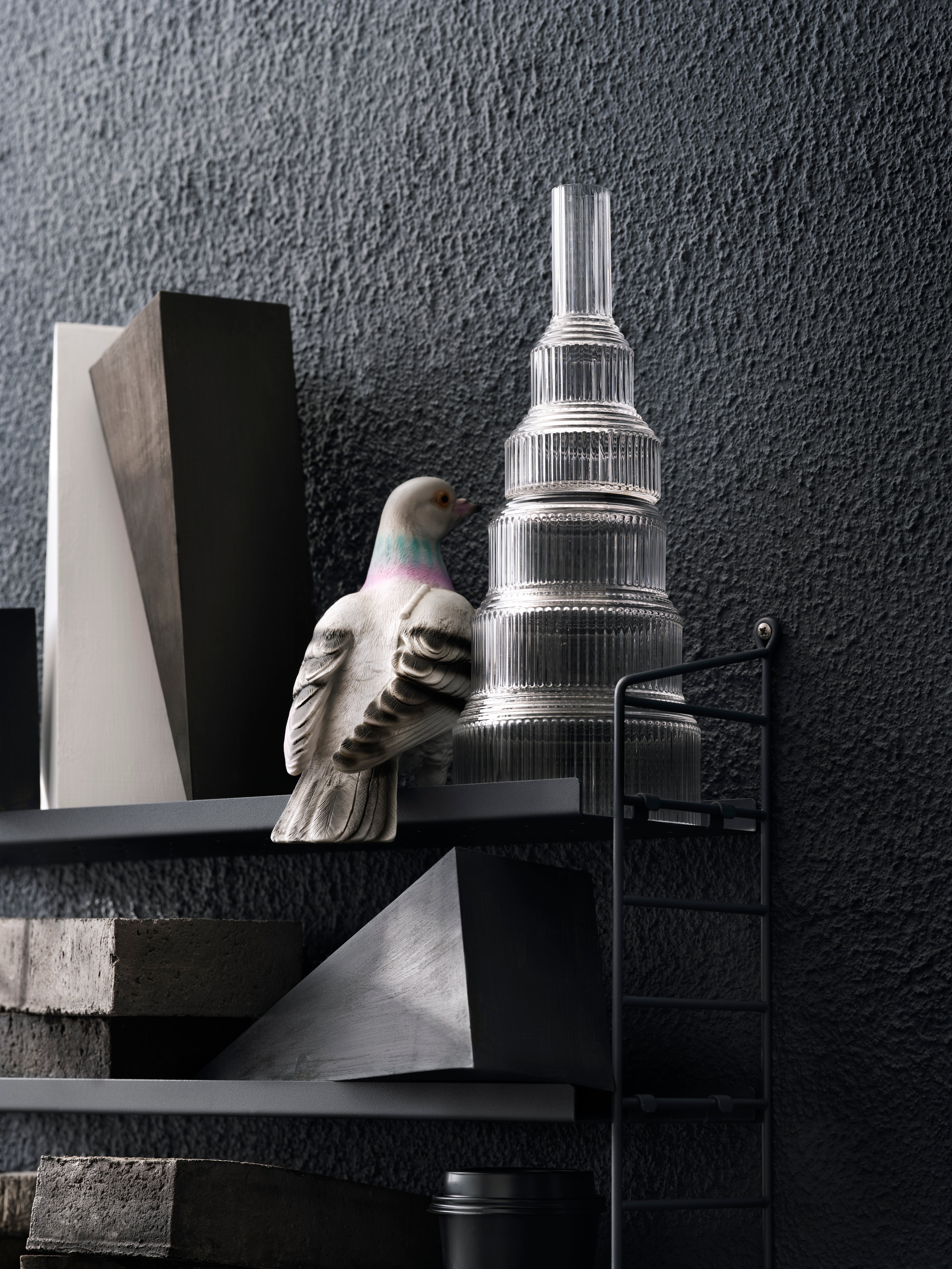 String® Pocket metal is sold as a complete shelf but is equally flexible as String® System. String® Pocket invites creativity and personality where you can combine two or three String® Pocket shelves into one larger shelf. Mix and match different colours to suit your style and preferences. The perforated metal shelves with low edge, 2 cm, makes it possible to add hooks and rods (30 cm and 58 cm) to increase the storage possibilities. String® Pocket metal is sold as one complete unit containing two wire panels, height 50 cm, and three metal shelves, width 58 cm and depth 15 cm.