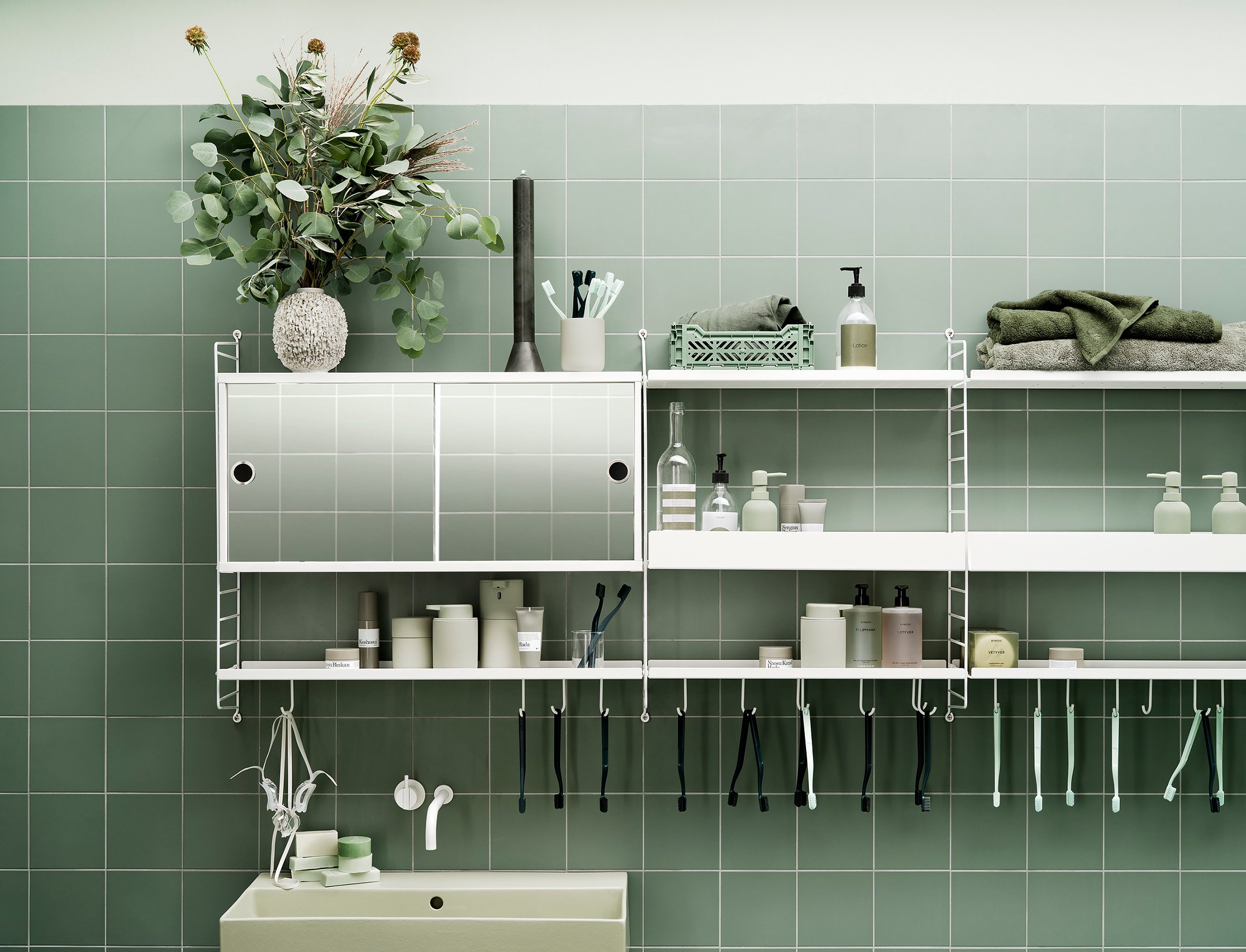 For the smaller bathrooms, we have a wall-hung 20 cm deep and 75 cm high combination It has three shelves with added hooks and a rod for increased storage.