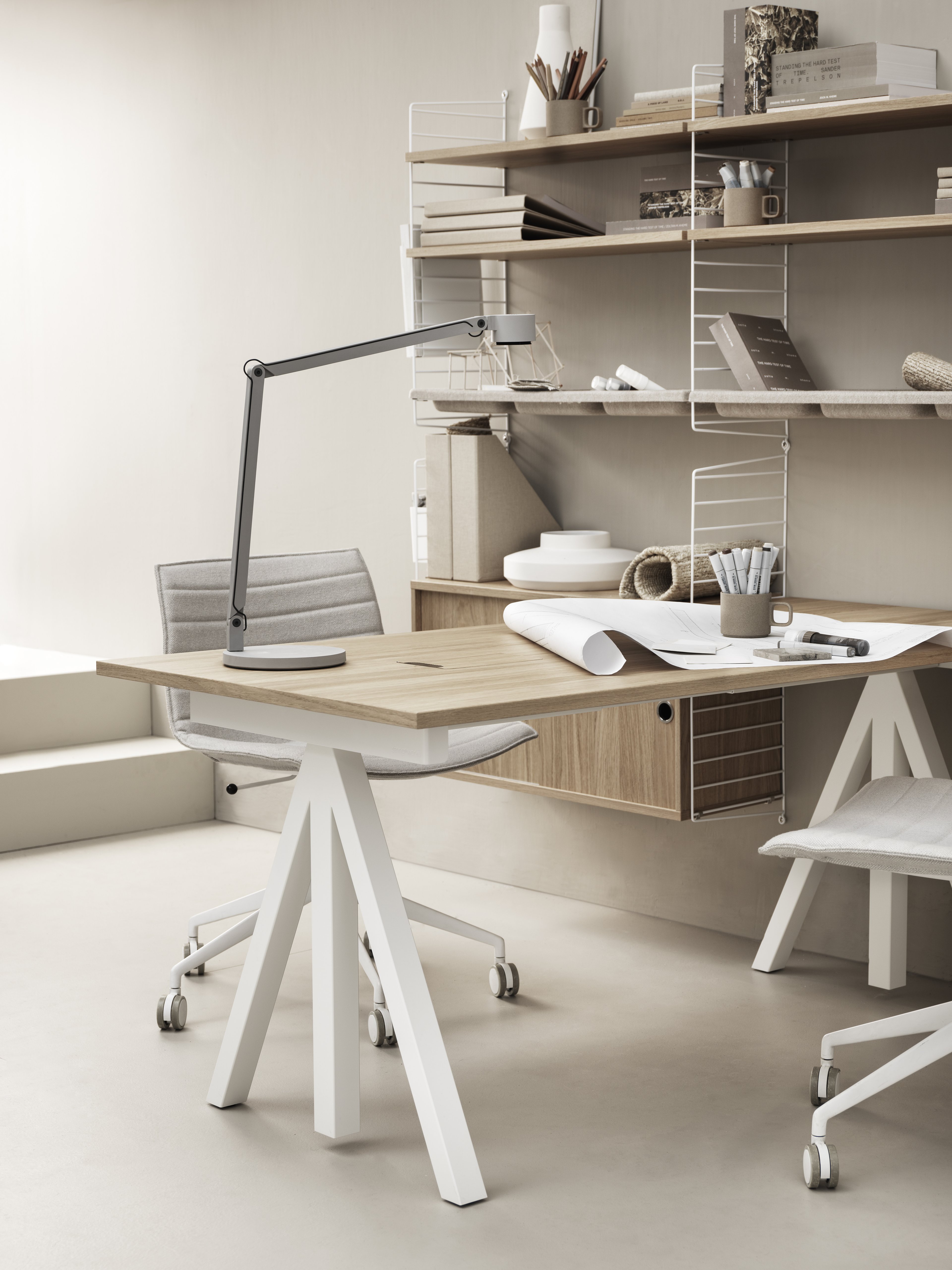 With its unique design, the work desk from Works makes it possible to create flexible workspaces. The work desk consists of one fixed table frame and one work desk with cable cover and the height can be adjusted 1 cm. The work desks with 78 cm depth are available in three widths: 120, 140 and 160 cm. The work desk with 90 cm depth and 180 cm width is intended for a meeting table or for a larger workspace, which is why the cable cover is placed in the middle. The frame’s height (including the work desk) is 72.5 cm and fits to all work desks.