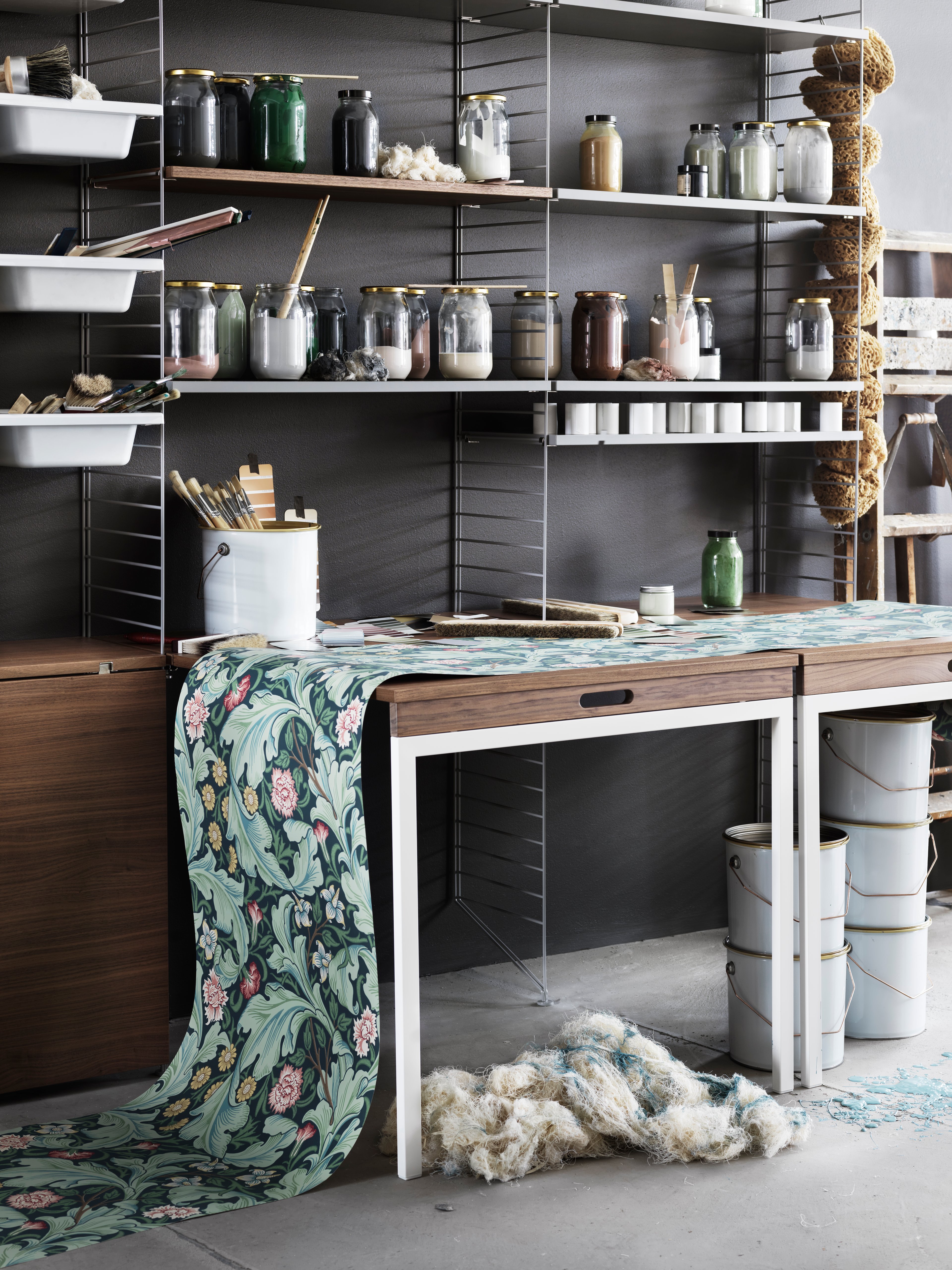 The folding table can be folded up and down with ease due to its flexible construction. The dimensions when folded up: w78 x d96 x h71 cm. When folded down the table melts into the shelf and then has the following dimensions: w78 x d30 x h71 cm. The folding table fits into 30 cm deep wire floor panels from String® System. The folding table is well suited for a smaller kitchen or other narrow spaces where a permanent table would be in the way. Maximize the usage and let the folding table act as your workspace during the day and dinner table at night.