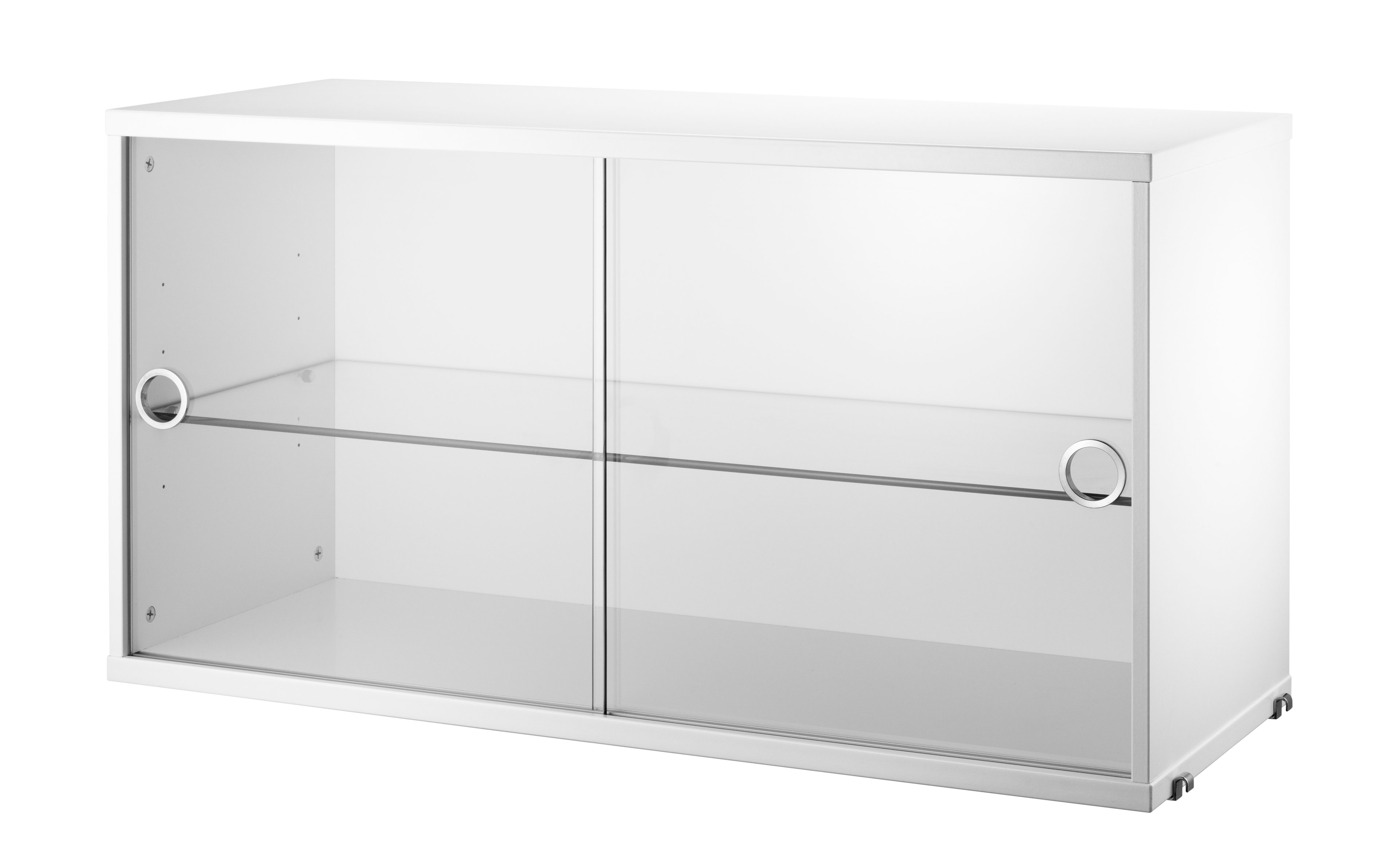 The display cabinet with sliding glass doors is available in one width, 78 cm, and one depth, 30 cm. The display cabinets fit into all wire panels from String® System if the depth of the panels is 30 cm. It is visually pleasing to add a bolder element to your shelf, like a cabinet, which also give you a lot of extra storage and the possibility to showcase something fragile. The display cabinet consists of one adjustable inner shelf in glass and the internal dimensions are: depth 26 cm, width 74 cm, and height 38 cm. The display cabinet is delivered unassembled.