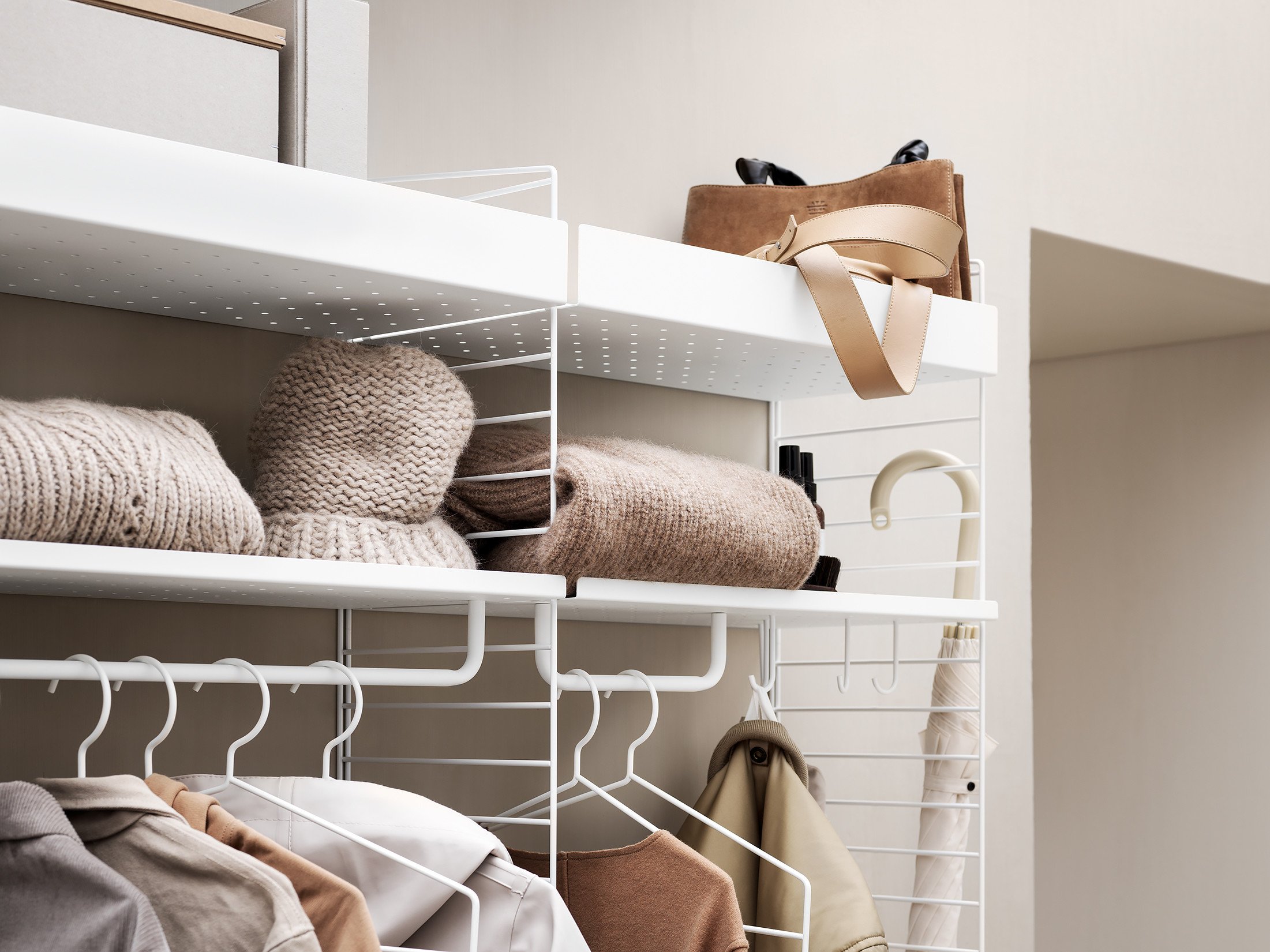 For the medium sized hallway, this two-section wall hung combination with added hooks and rod gives you plenty of storage possibilities.