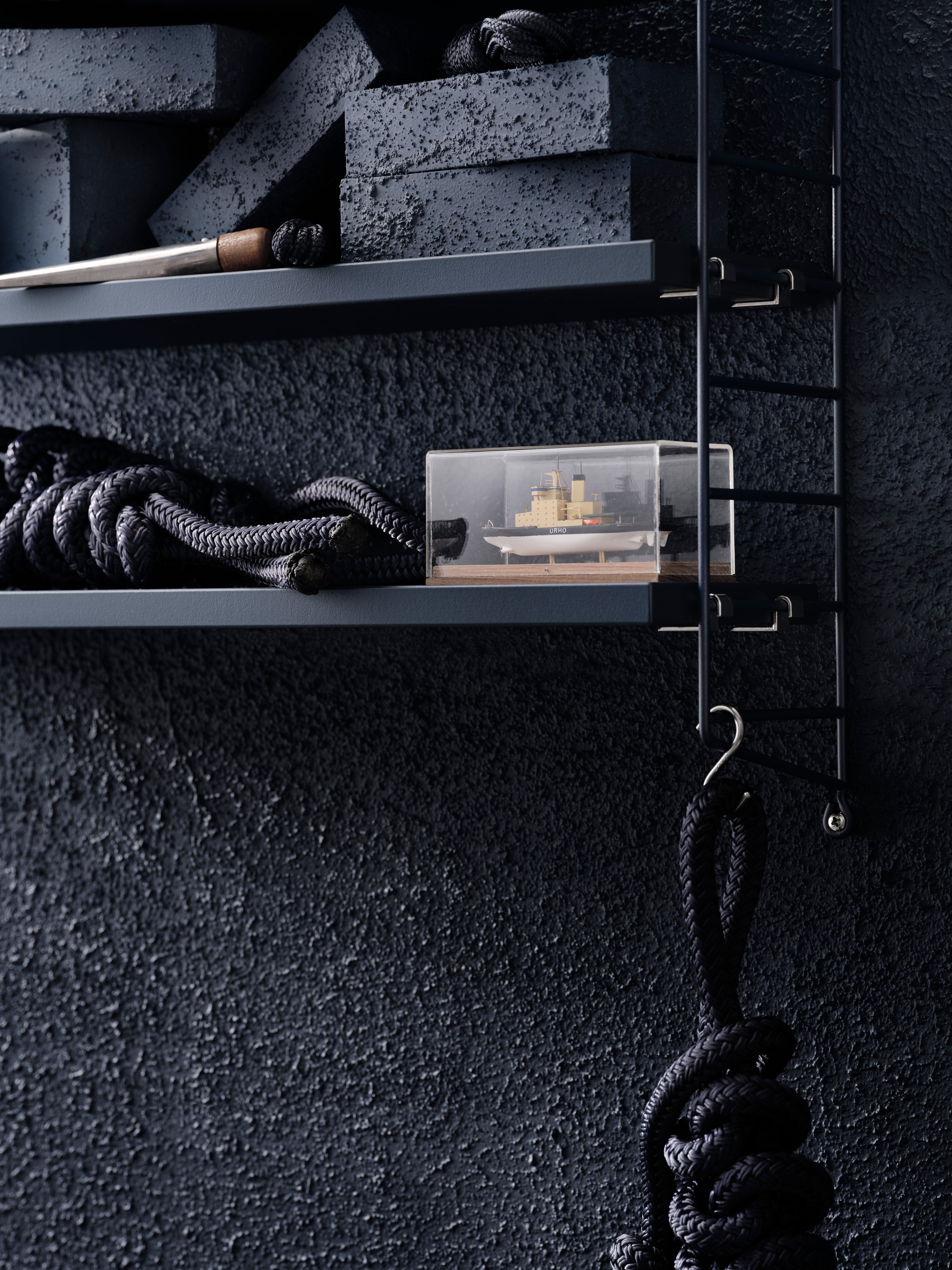 String® Pocket is sold as a complete shelf but is equally flexible as String® System. String® Pocket invites creativity and personality where you can combine two or three String® Pocket shelves into one larger shelf. Mix and match different colours and wooden alternatives to suit your style and preferences. Since the shelf is neat and practical it fits equally well as a nightstand as an extra shelf in your hallway. String® Pocket is sold as one complete unit containing two wire panels, height 50 cm, and three shelves, width 58 cm and depth 15 cm.