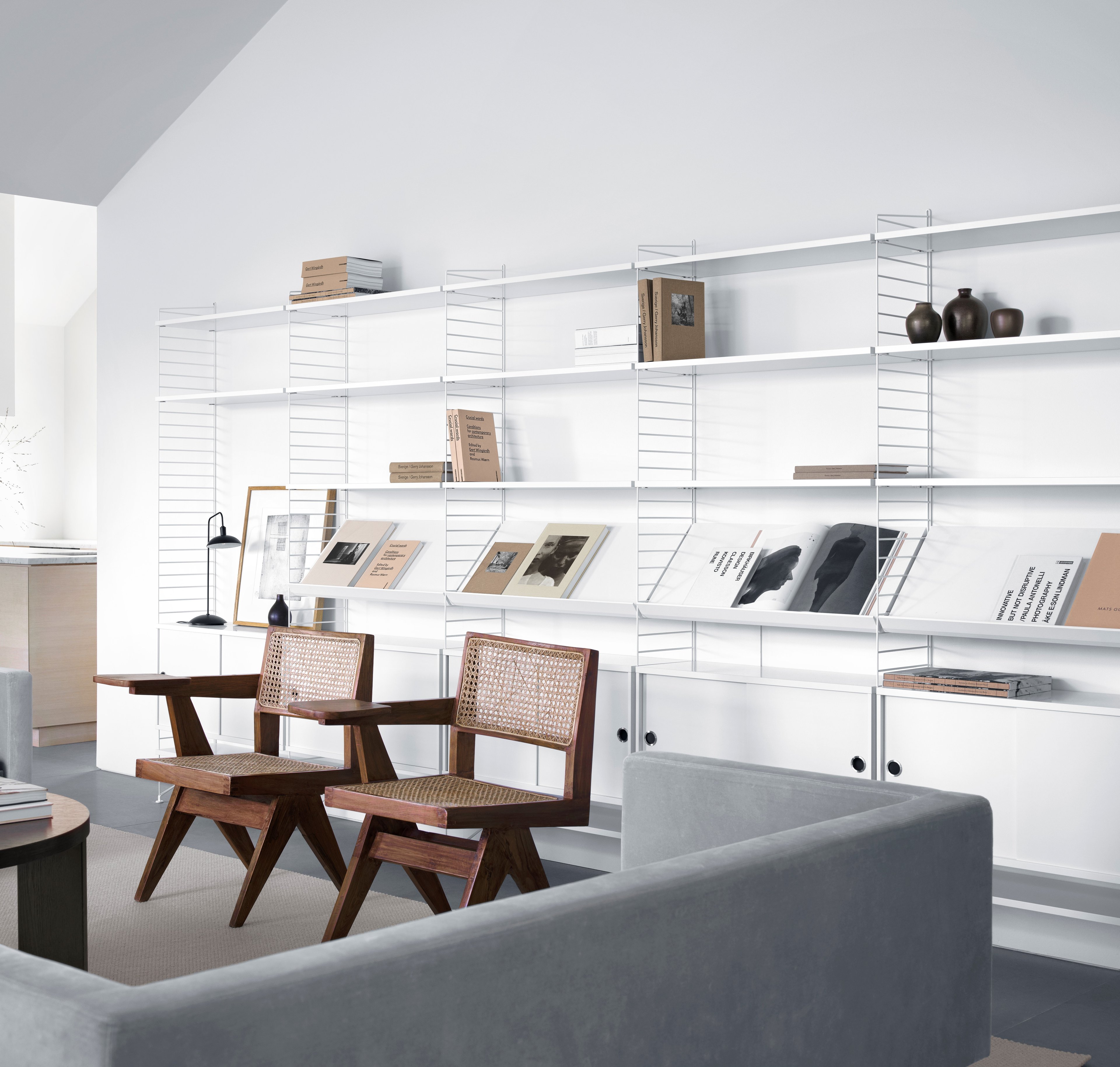 This larger combination got it all. Store you most beloved objects and books on the shelves, magazines on the tilted shelves and hide the other stuff in the cabinets. You will not miss anything with this combination.