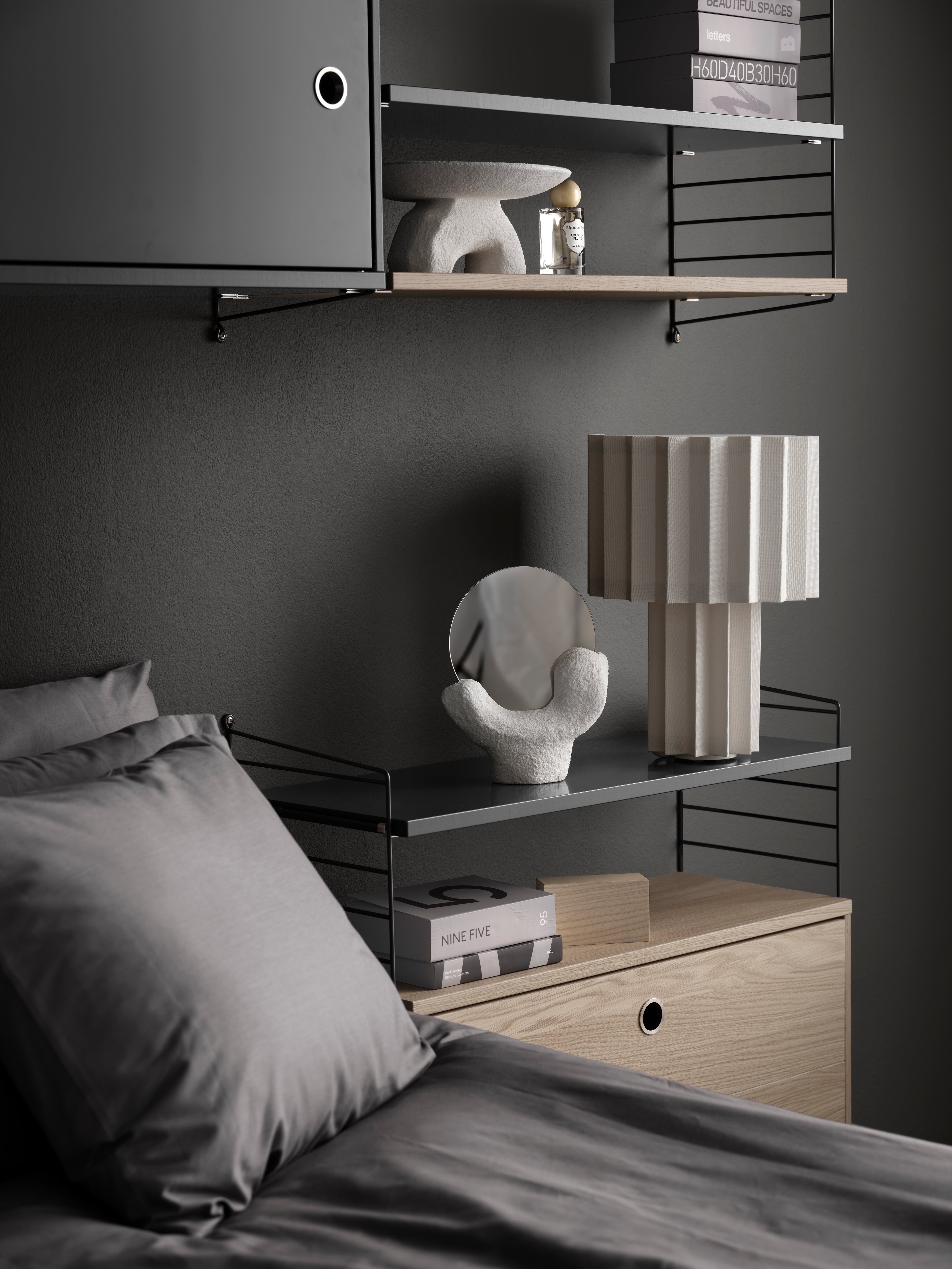 The chests of drawers are available in two widths, 78 and 58 cm, and one depth, 30 cm. The chests of drawers fit into all 30 cm deep wire and plex panels from String® System. They are designed with two drawers to offer hidden storage in your shelving combination. The chests of drawers are a great fit in either the hallway, living room or kids’ room where the need for hidden storage often is big. Chest of drawer w58 x d30 x h42 cm has internal dimensions (for each drawer) depth 23.7 cm, width 51.3 cm and height 16 cm. Chest of drawer w78 x d30 x h42 cm has internal dimensions (for each drawer) depth 23.7 cm, width 71.3 cm and height 16 cm. The chests of drawers are delivered unassembled.