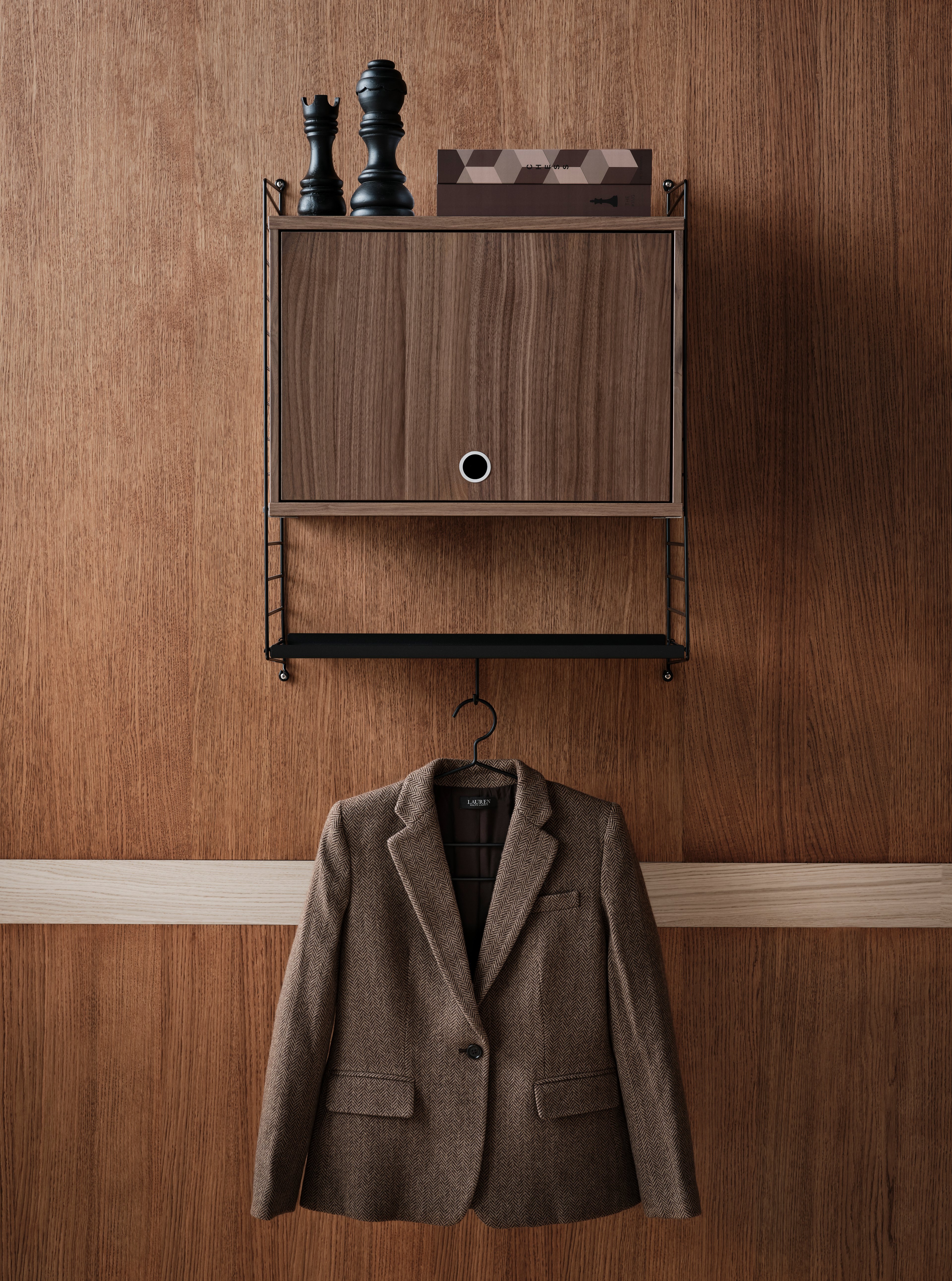 The coat-hanger is part of our range of accessories and was created to be able to offer a complete storage solution for your hallway and wardrobe, where rods often are added. The coat-hanger is designed with one extra wire thread to increase functionality and make it possible to hang several clothing items on one coat-hanger. Each packaging contains four coat-hangers.